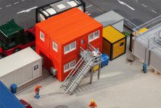 130135 4 Building site containers, orange.